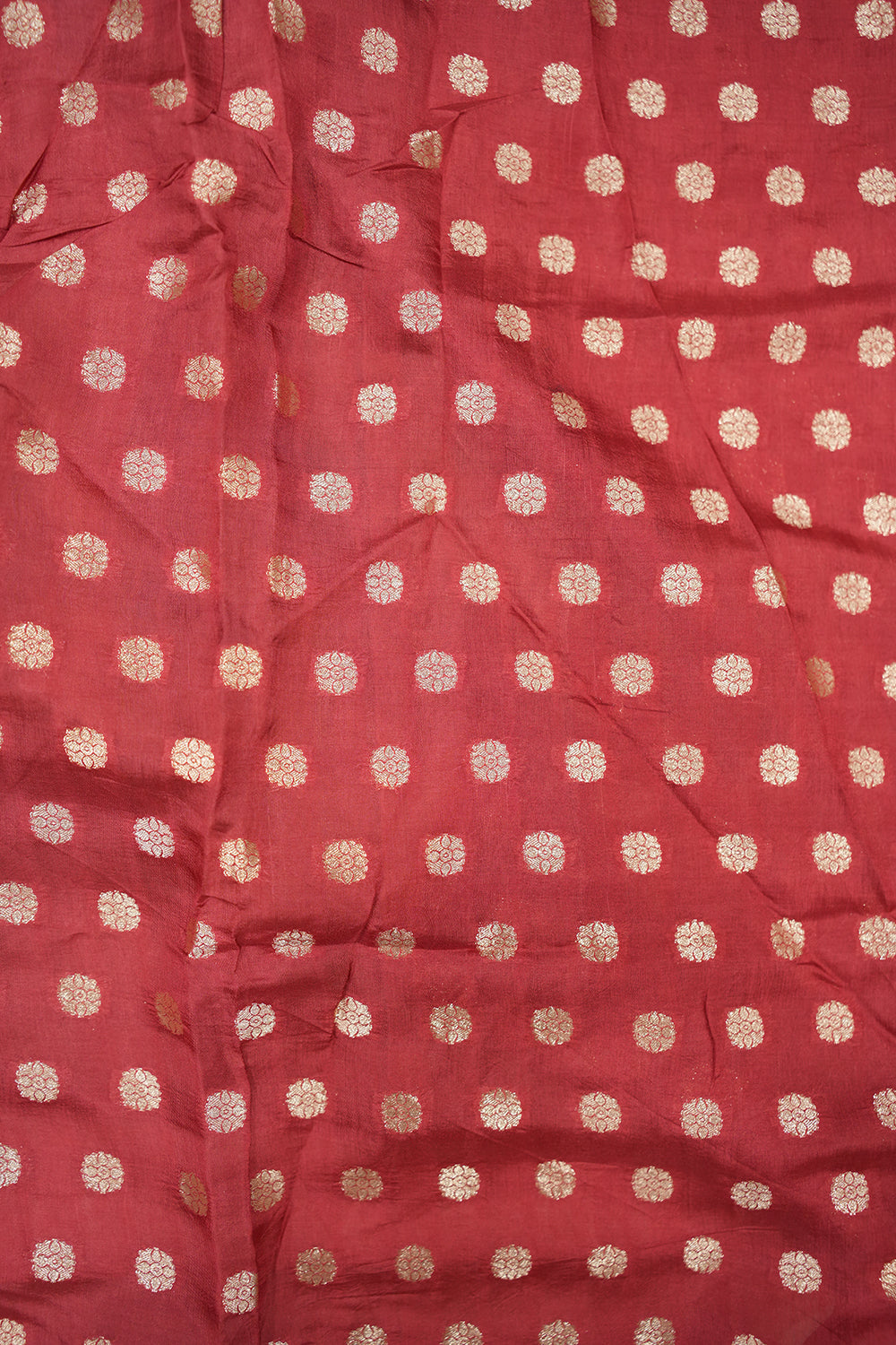 Dola silk saree featuring striking abstract prints in artistic patterns, offering a modern twist on traditional elegance with a soft, fluid drape.