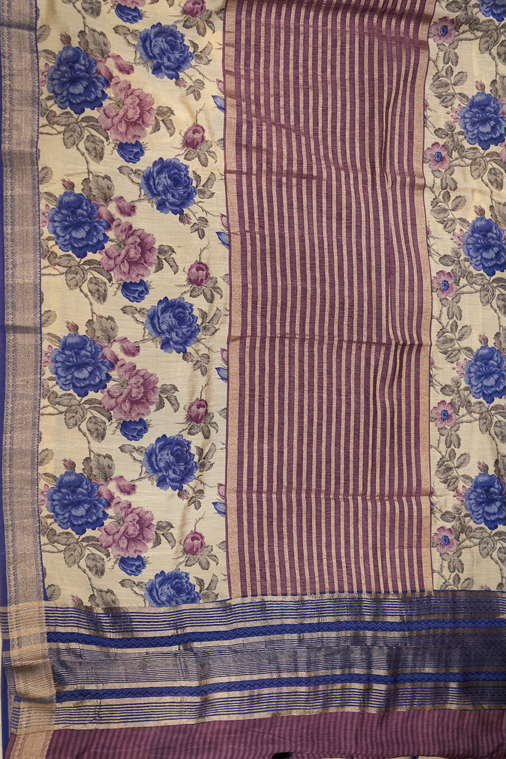 Blue Chanderi Tussar saree with a contrasting purple border and soft zari detailing, offering a lightweight and elegant drape.