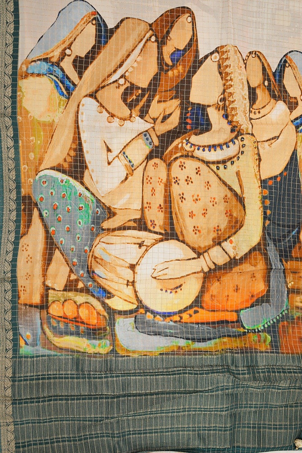 Vibrant Dola silk saree featuring intricate traditional motifs and a rich, elegant drape perfect for festive and cultural occasions.