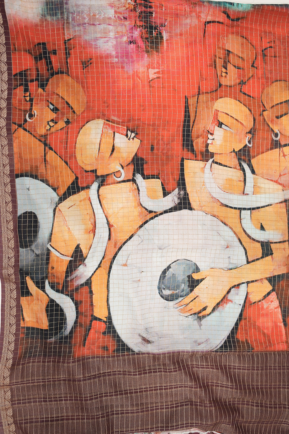 Orange chiffon Dola silk saree featuring a soft, flowy drape and subtle sheen, perfect for festive events and graceful occasions.