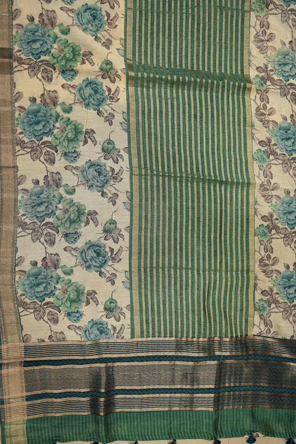 Green Chanderi Tussar saree with subtle zari detailing and a soft, elegant drape, perfect for festive and semi-formal occasions.