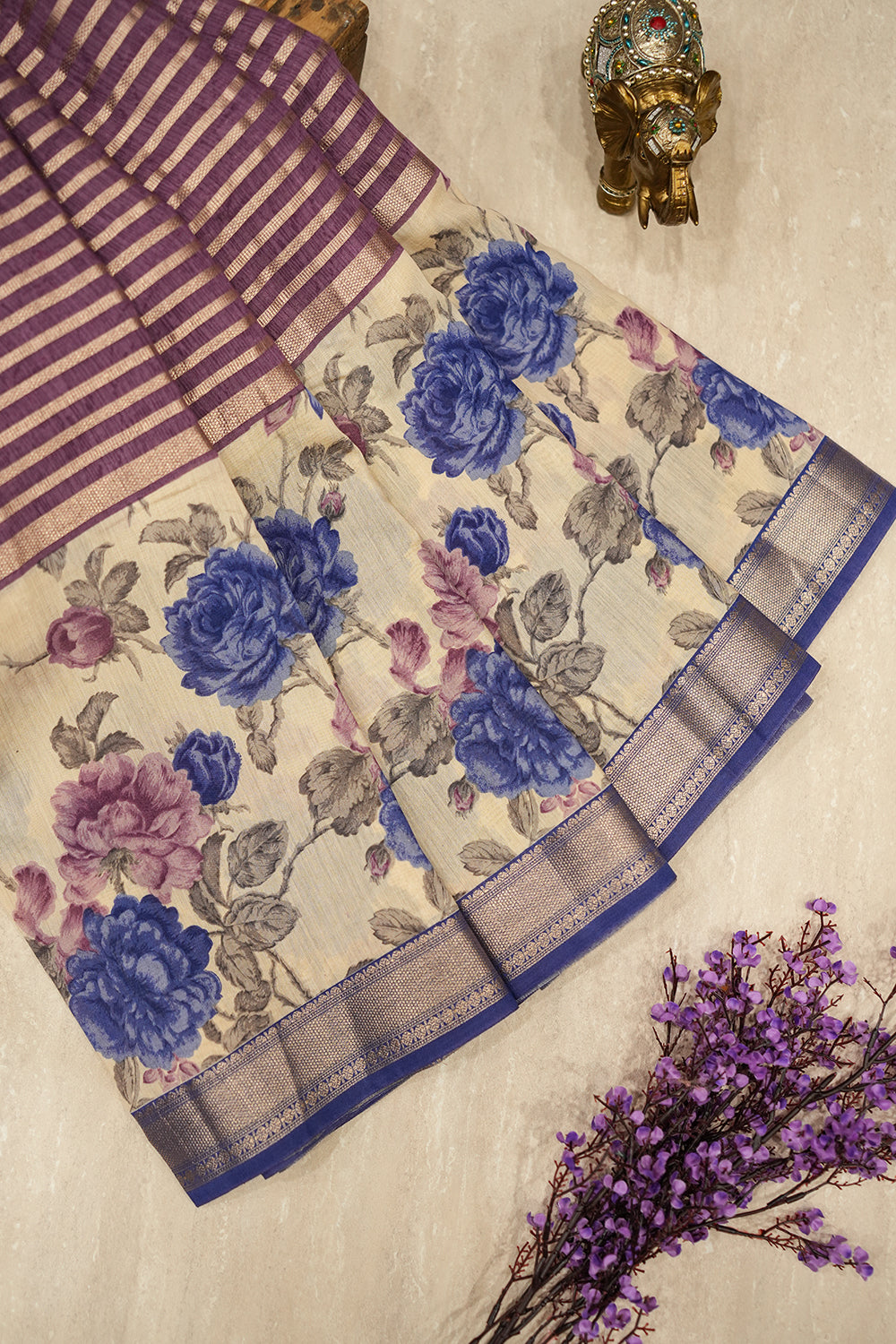 Blue Chanderi Tussar saree with a contrasting purple border and soft zari detailing, offering a lightweight and elegant drape.