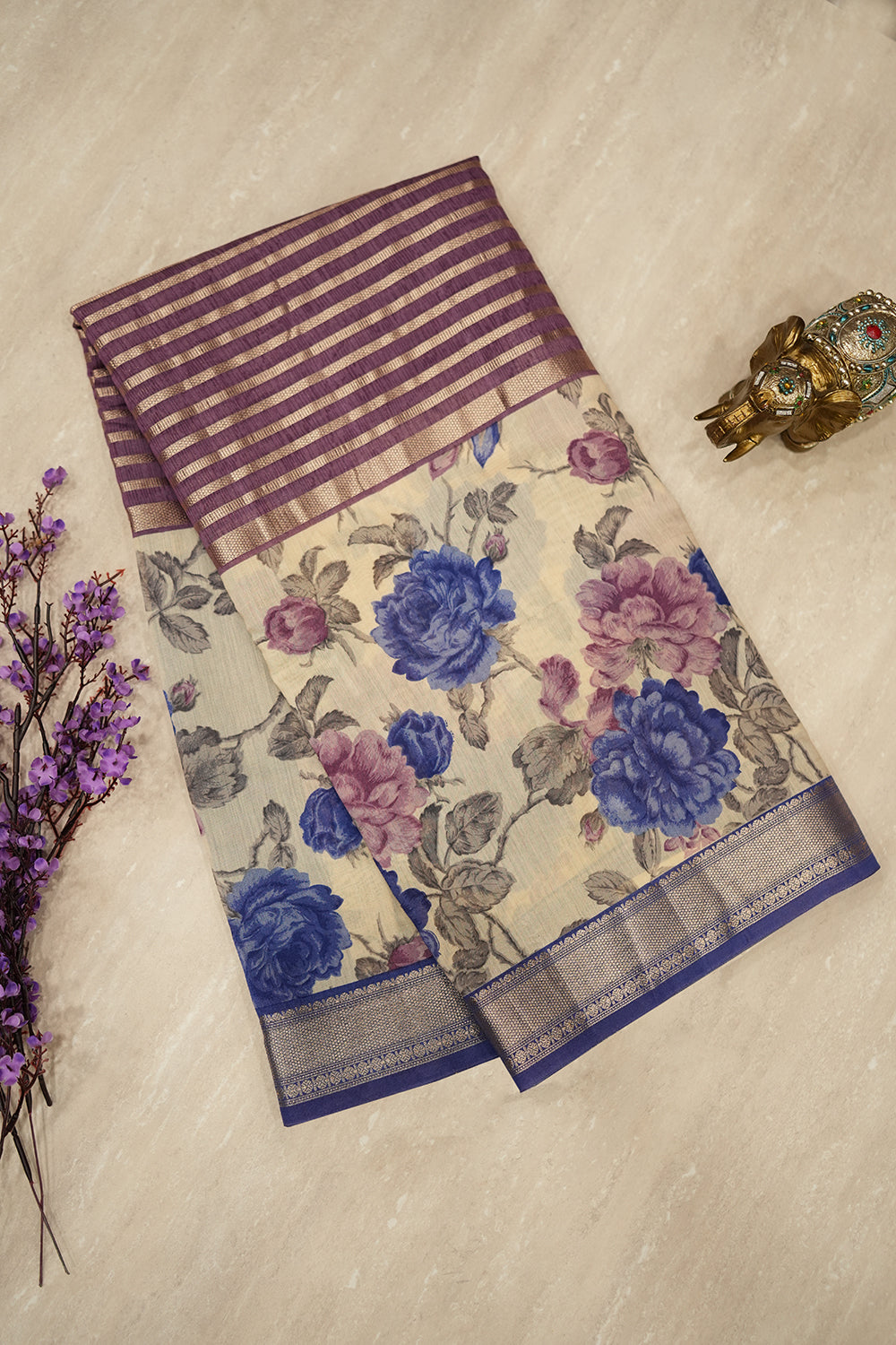 Blue Chanderi Tussar saree with a contrasting purple border and soft zari detailing, offering a lightweight and elegant drape.