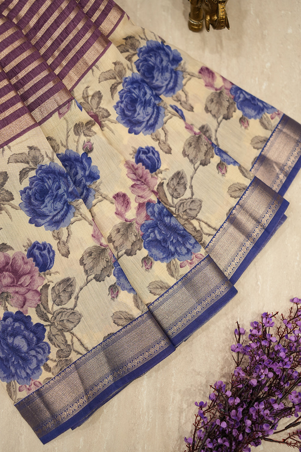 Blue Chanderi Tussar saree with a contrasting purple border and soft zari detailing, offering a lightweight and elegant drape.