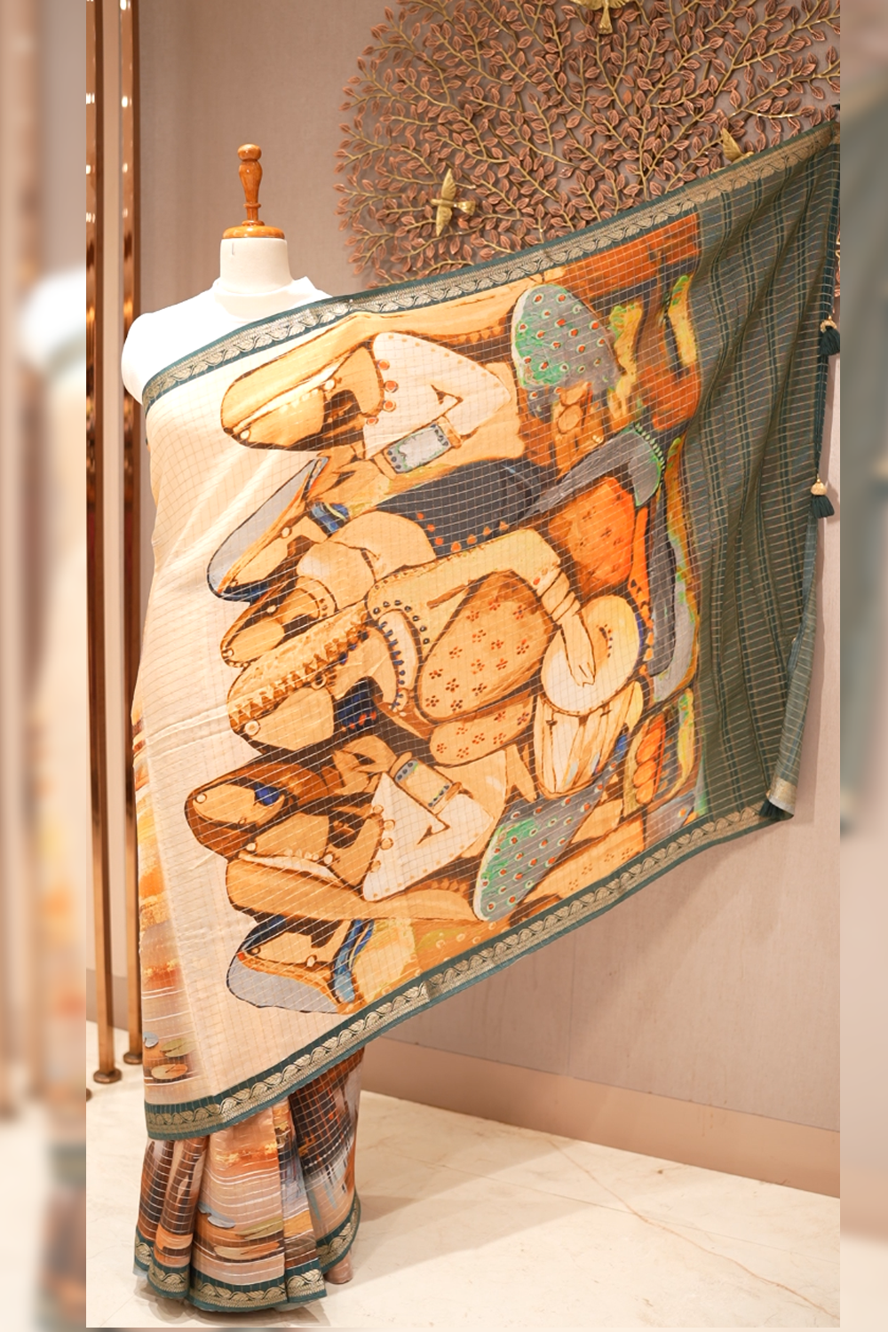 Vibrant Dola silk saree featuring intricate traditional motifs and a rich, elegant drape perfect for festive and cultural occasions.