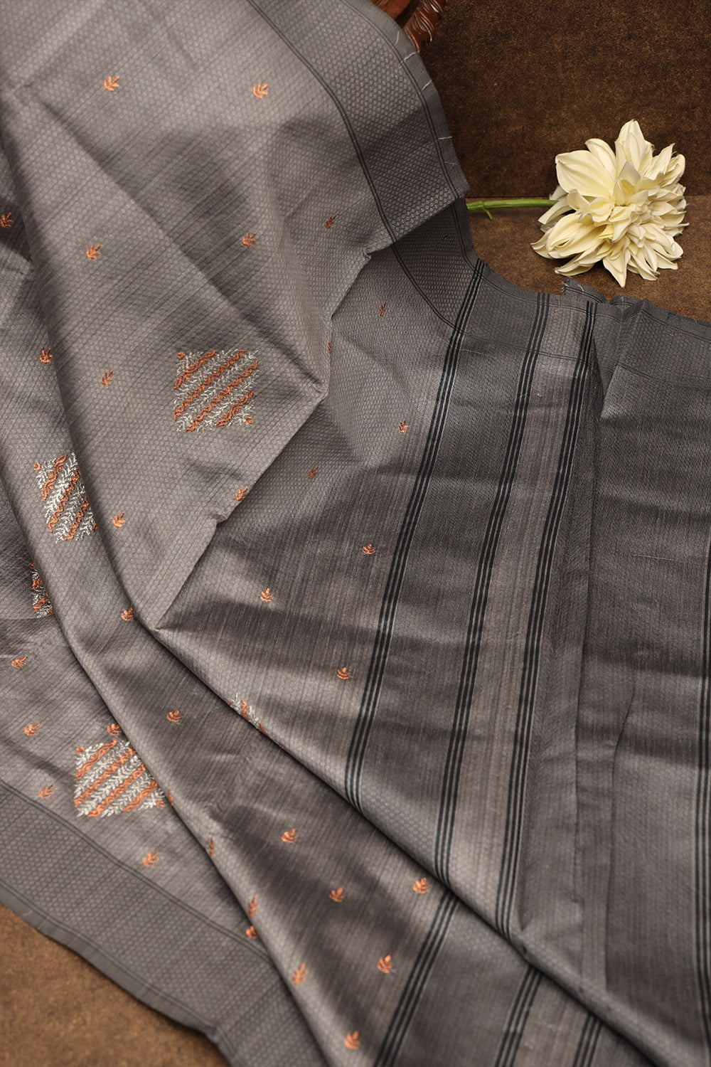 Grey with elephant black raw silk saree