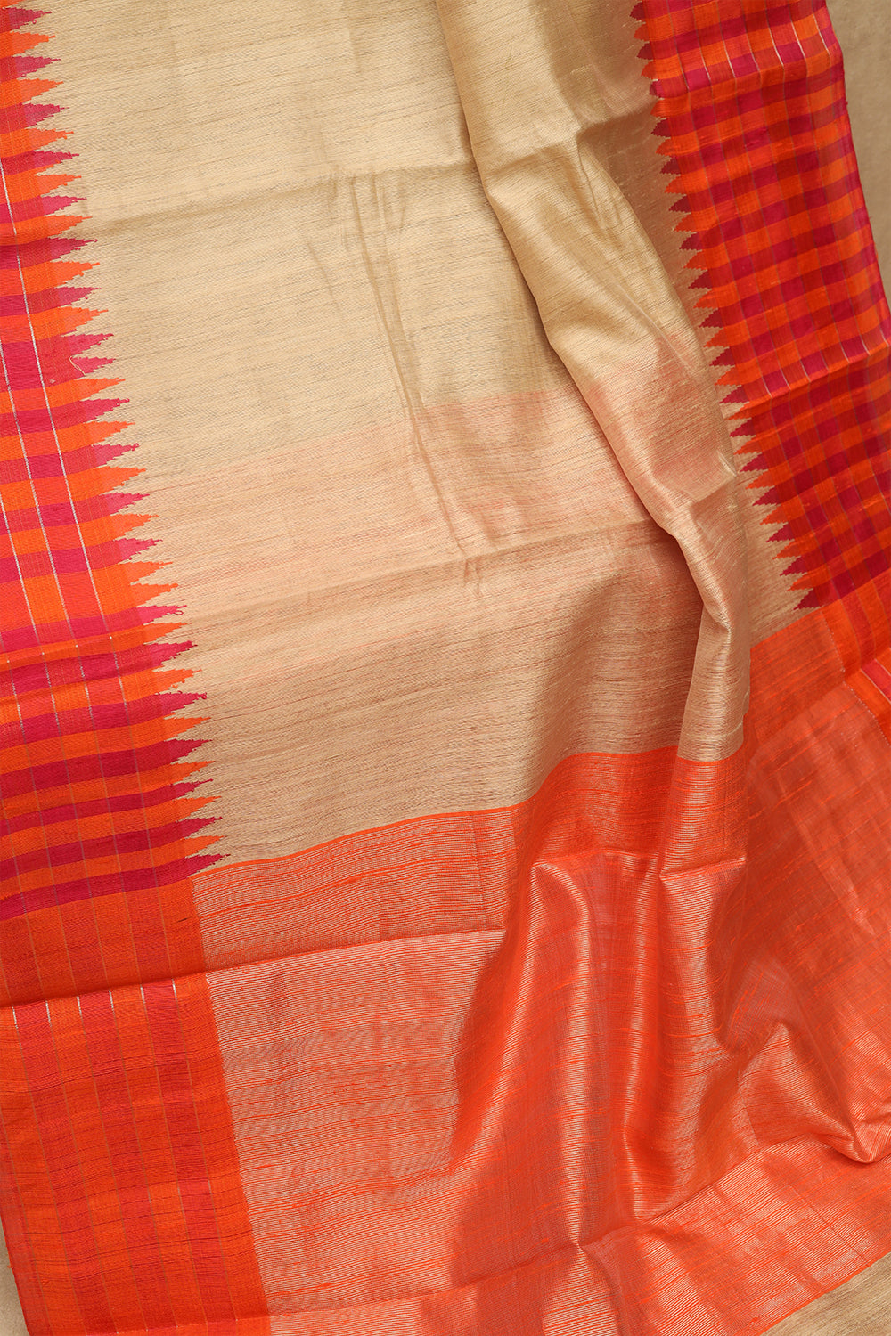 Off white with pink and orange jute saree