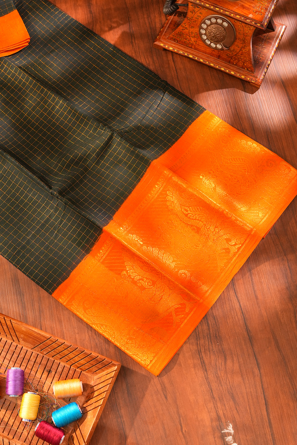 Bottle Green Checked Silk Cotton Saree with Contrast Orange Peacock Pallu