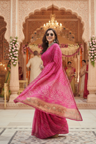 Rani Pink Bandhani Saree with Traditional Brown Floral Border
