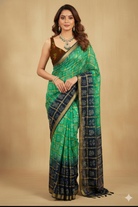 Traditional Green & Navy Blue Dual-Tone Gharchola Bandhani Saree