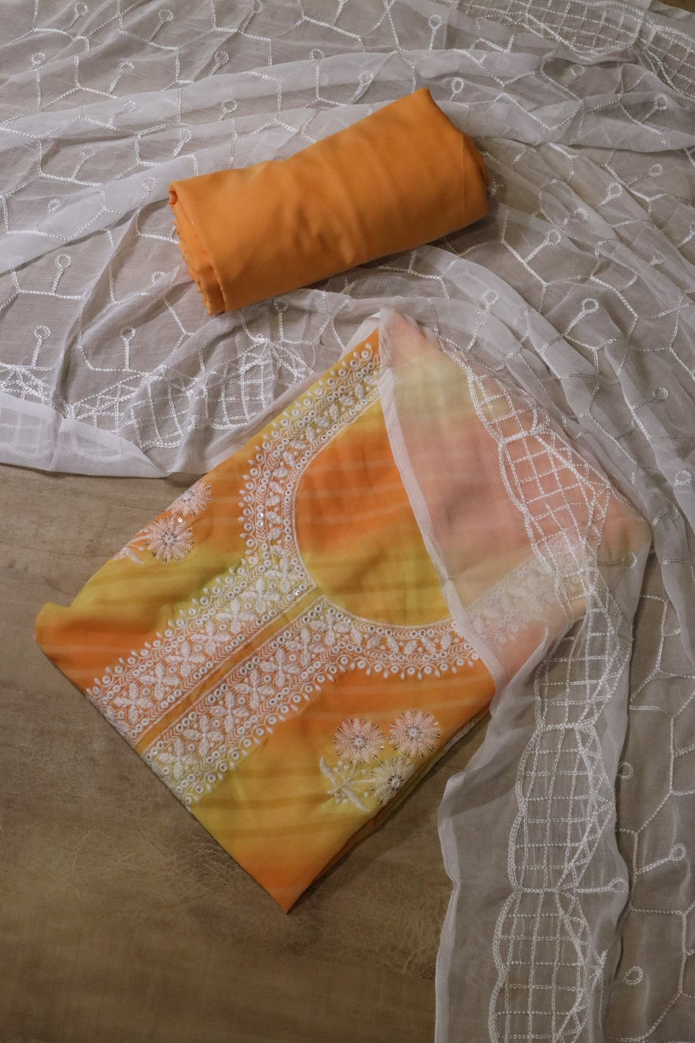 Yellow and orange salwar material